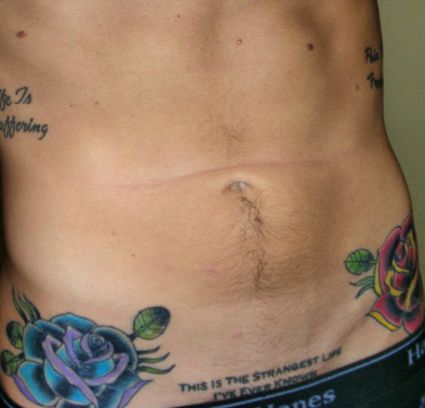 Flowers Tattoo On Stomach 